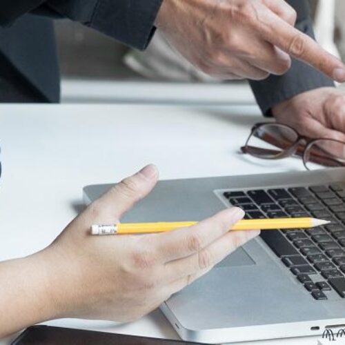 Successful corporation of young business team.